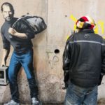 Steve Jobs auf Mauer in Flüchtlingsanlage in Calais